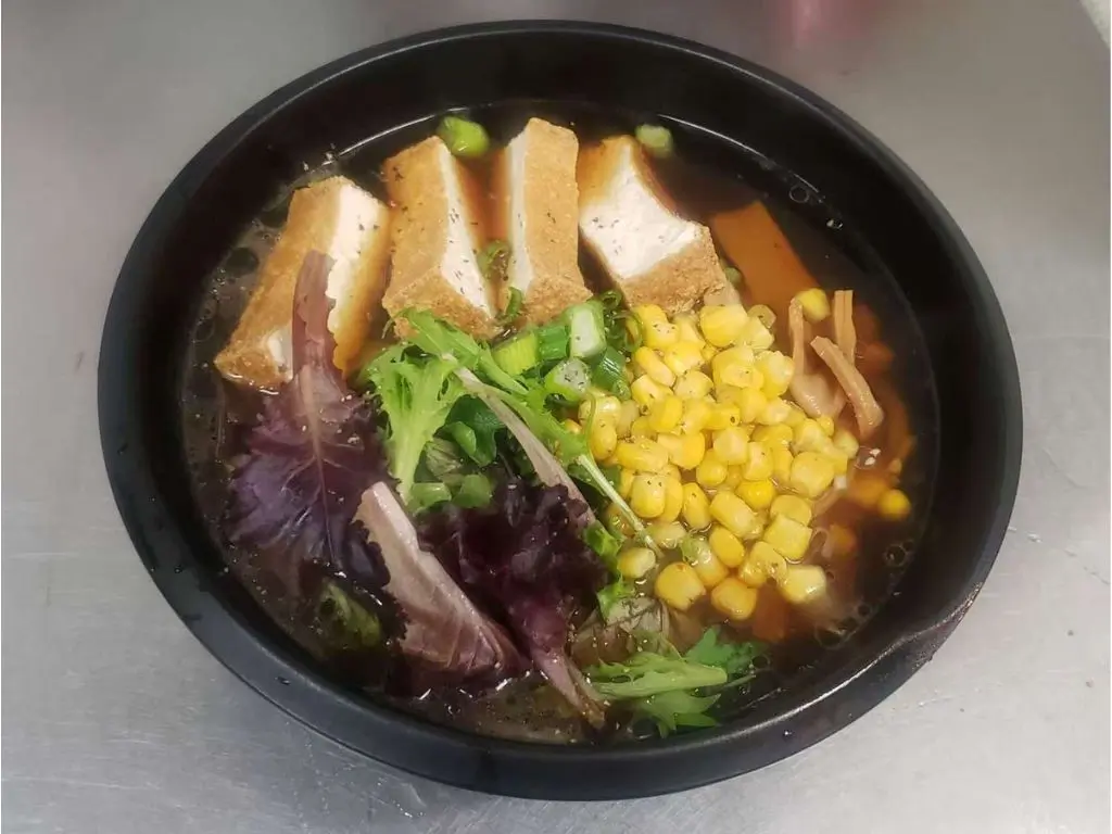 Luv-Ramen-&-BBQ-Japanese-restaurant-Tofu-Vegetable-Ramen-Hawthorne Ramen soup with crispy tofu, corn, mixed greens, and scallions in a flavorful broth at Luv Ramen & BBQ, a Japanese restaurant in Hawthorne